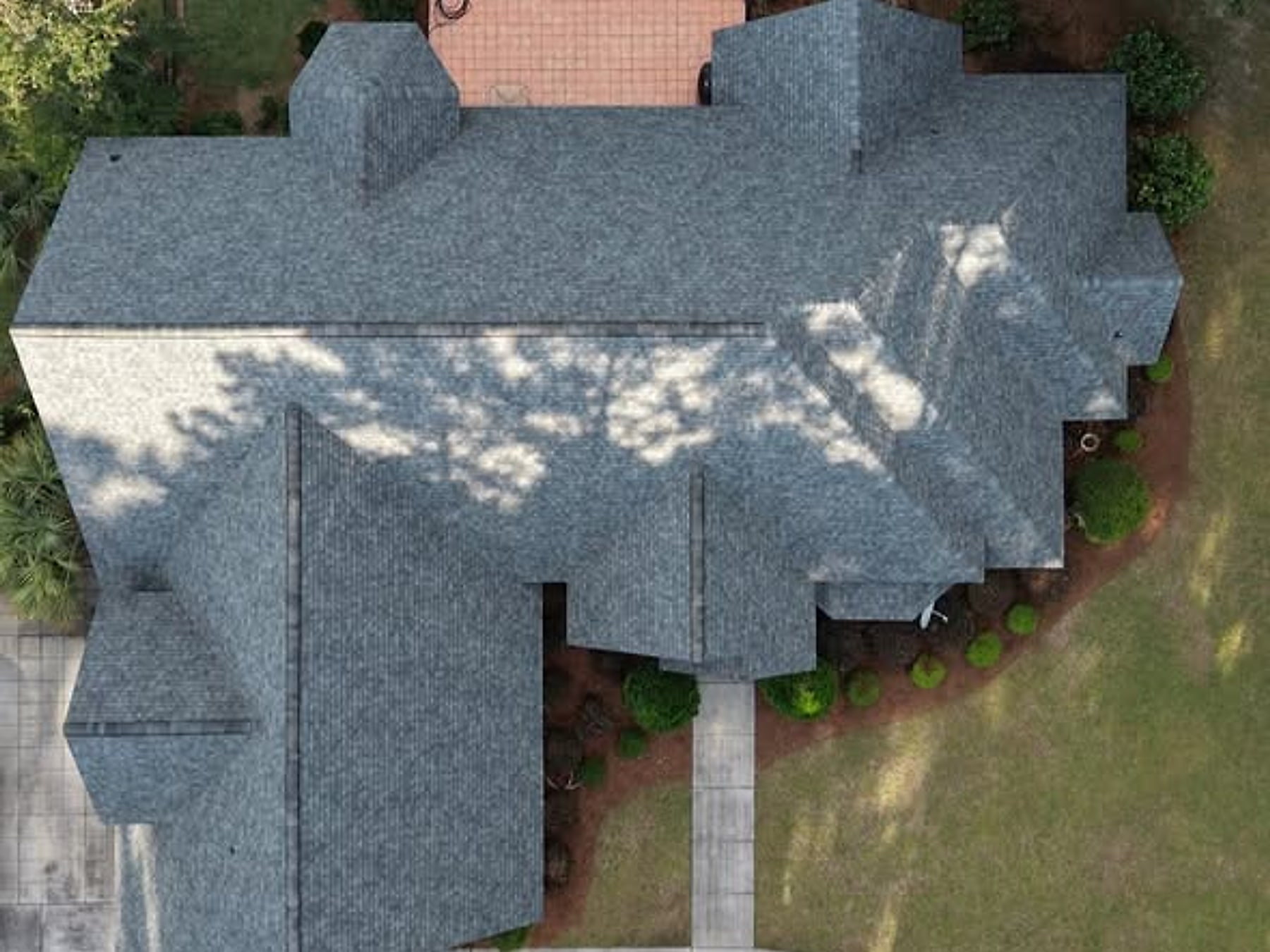 Finished — Yard cleaned, nails swept, debris hauled off. You get the roof, not the mess.